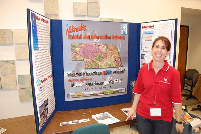 Deborah Bathke, a climatologist with the National Drought Mitigation Center and the Department of Earth and Atmospheric Sciences, teaches people about the Nebraska Rainfall and Information Network." Photo courtesy of Ken Dewey.