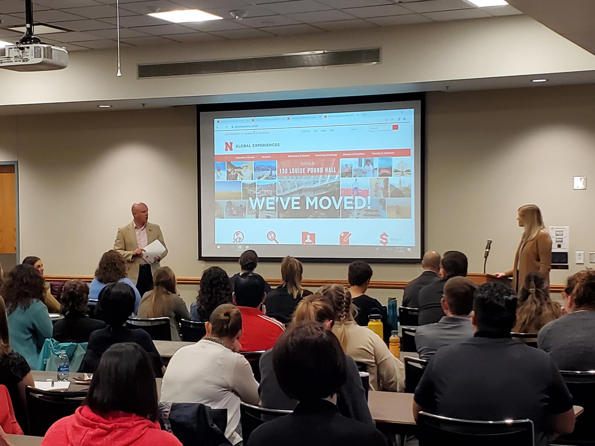 Dr. Cody Hollist and Kate (Kunzman) Aufdenkamp speak to advisors about the Global Experiences Office