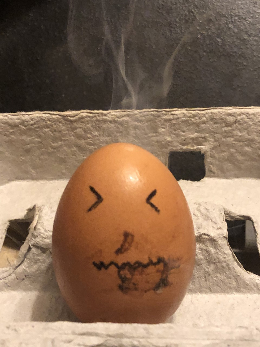 egg with smoke behind it