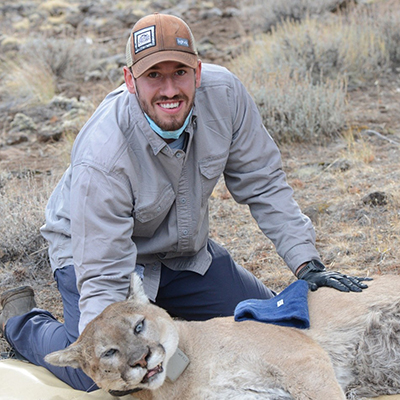 Jake Harvey with a mountain lion.
