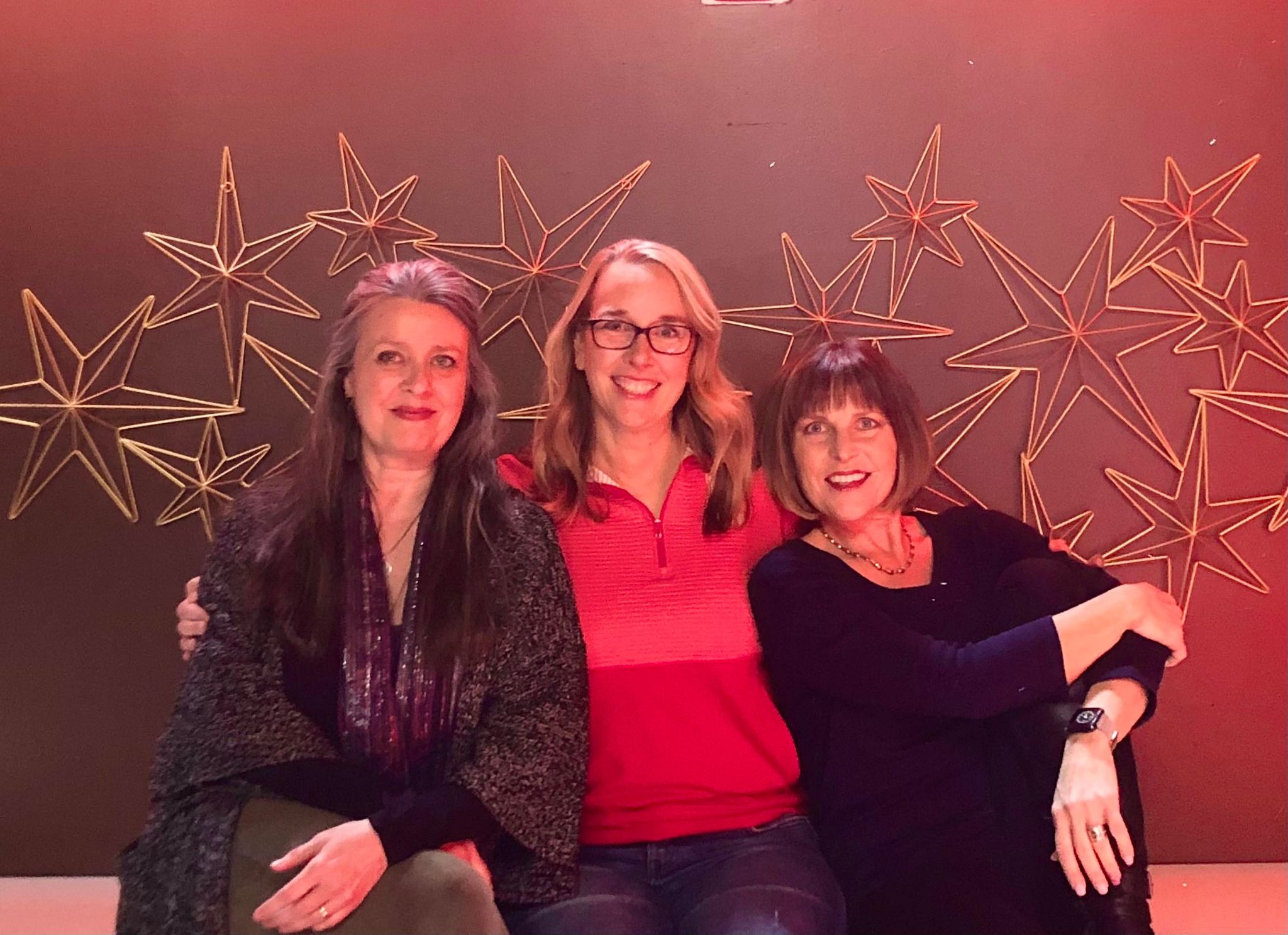 Left to right:  Dance alumni board members Cary Twomey, Kari Swanson Neth and Shelley Brackhan Fritz welcome dance alumni to attend a get together on Dec. 3 at Barrymore’s following the Dec. 3 Student Dance Project performance.