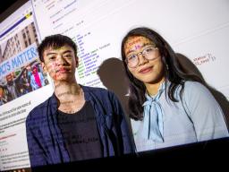 The University of Nebraska–Lincoln will introduce a new data science major in 2023. Pictured here are School of Computing students Eric Le and Vy Doan, who used machine learning to analyze Twitter news data as part of a UCARE project.