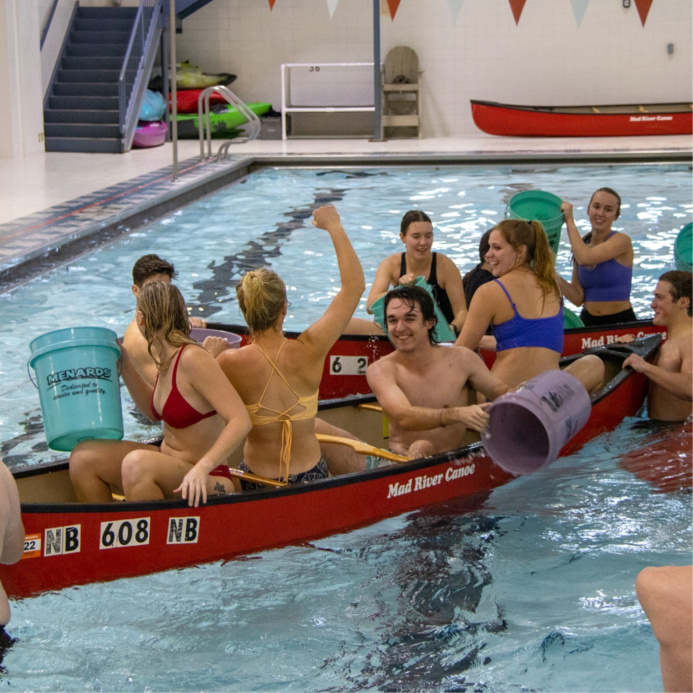 Battleship is played in canoes at the pool in the Campus Rec Center.