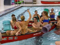 Battleship is played in canoes at the pool in the Campus Rec Center.