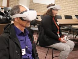 Many attendees, including Timothy Janda and Leah Widdowson, tried virtual reality and learned how it could be used in the classroom at the Fall 2022 Teaching and Learning Symposium. November 11, 2022. Photo by Molly Mayhew / CTT