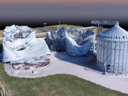 A 3D rendering of grain bins following an August 2020 windstorm. The rendering was produced with the aid of lidar — near-infrared laser beams fired at the structures by a drone flying above the site.  Christine Wittich / Richard Wood