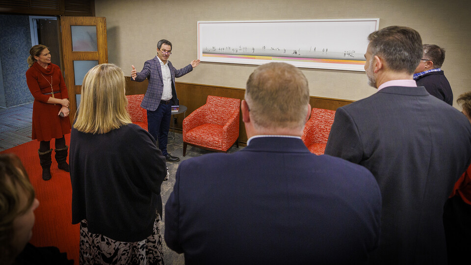 Craig Chandler | University Communication and Marketing Along with the graphite drawings, "We Are Nebraska" includes an acrylic paint pattern that spans the bottom of the artwork. 