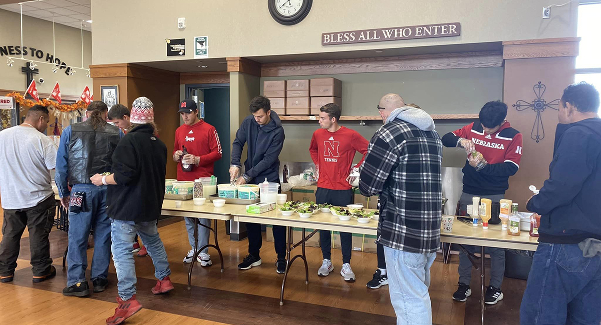 Did You Know: In 2022 members of Nebraska men's Tennis team took time during Thanksgiving break to help serve food to guests at Matt Talbot.