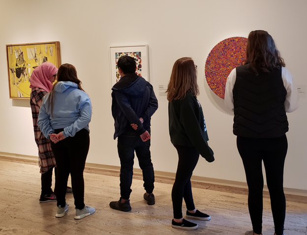 Students in SOCI 252 Health, Medicine, and Society explore what doctors can learn by studying art at the Sheldon Museum of Art. Photo credit: Dr. Lisa Kort-Butler.