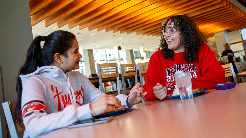 Students enjoy a meal in the Abel Dining Center