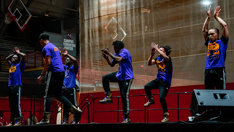 Students perform on stage during the Stroll-off held April 2, 2022 in the UNL Coliseum.