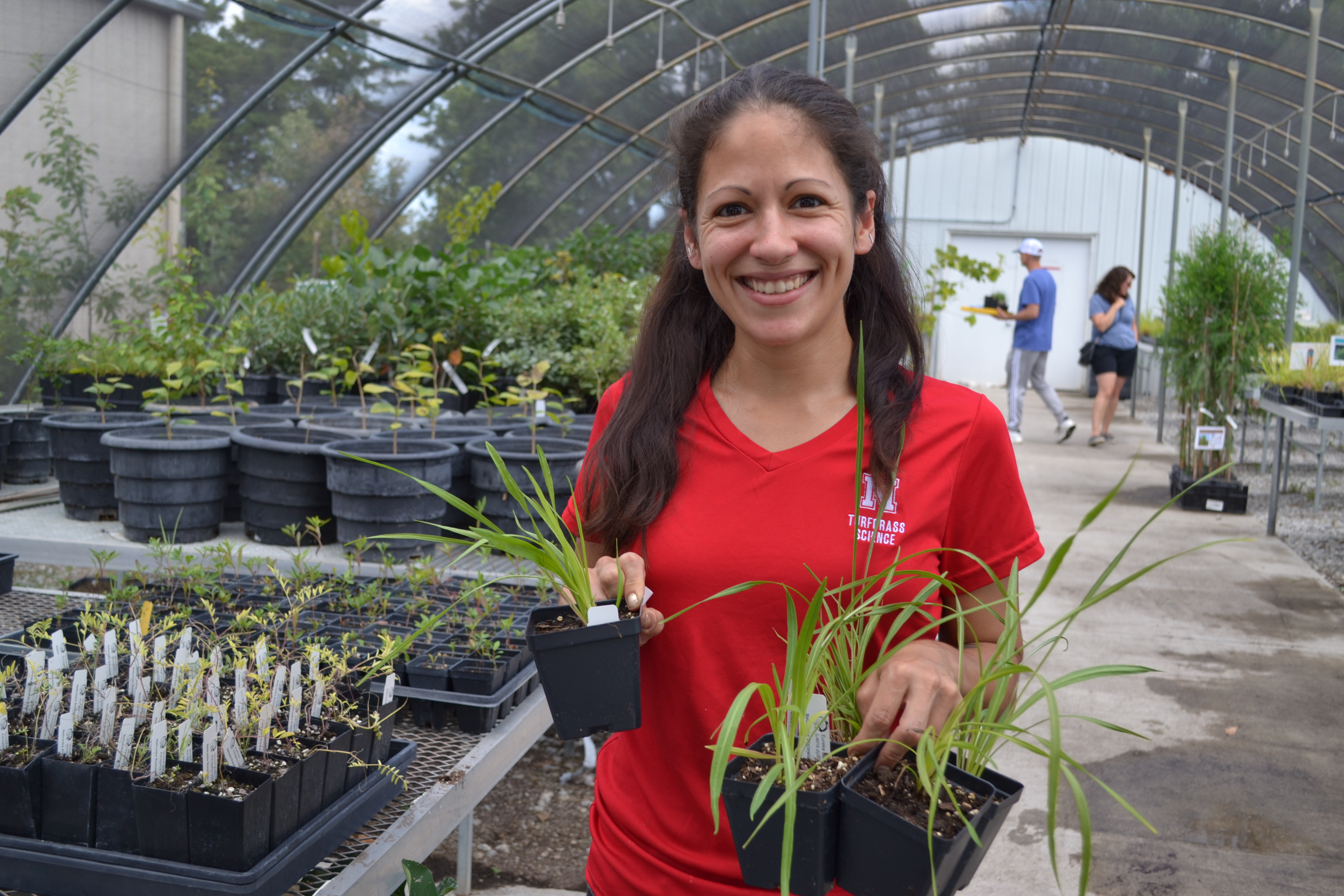 A UNL staff member shops at an NSA plant sale. 