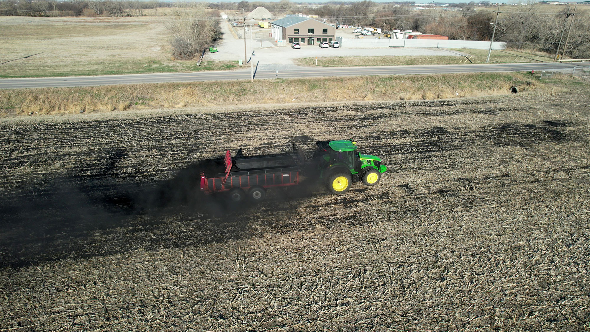 Biochar is applied to 16 acres of farmland in northeast Lincoln with a manure spreader during University of Nebraska–Lincoln research trials in April. Photo by Ann Powers | Agronomy and Horticulture