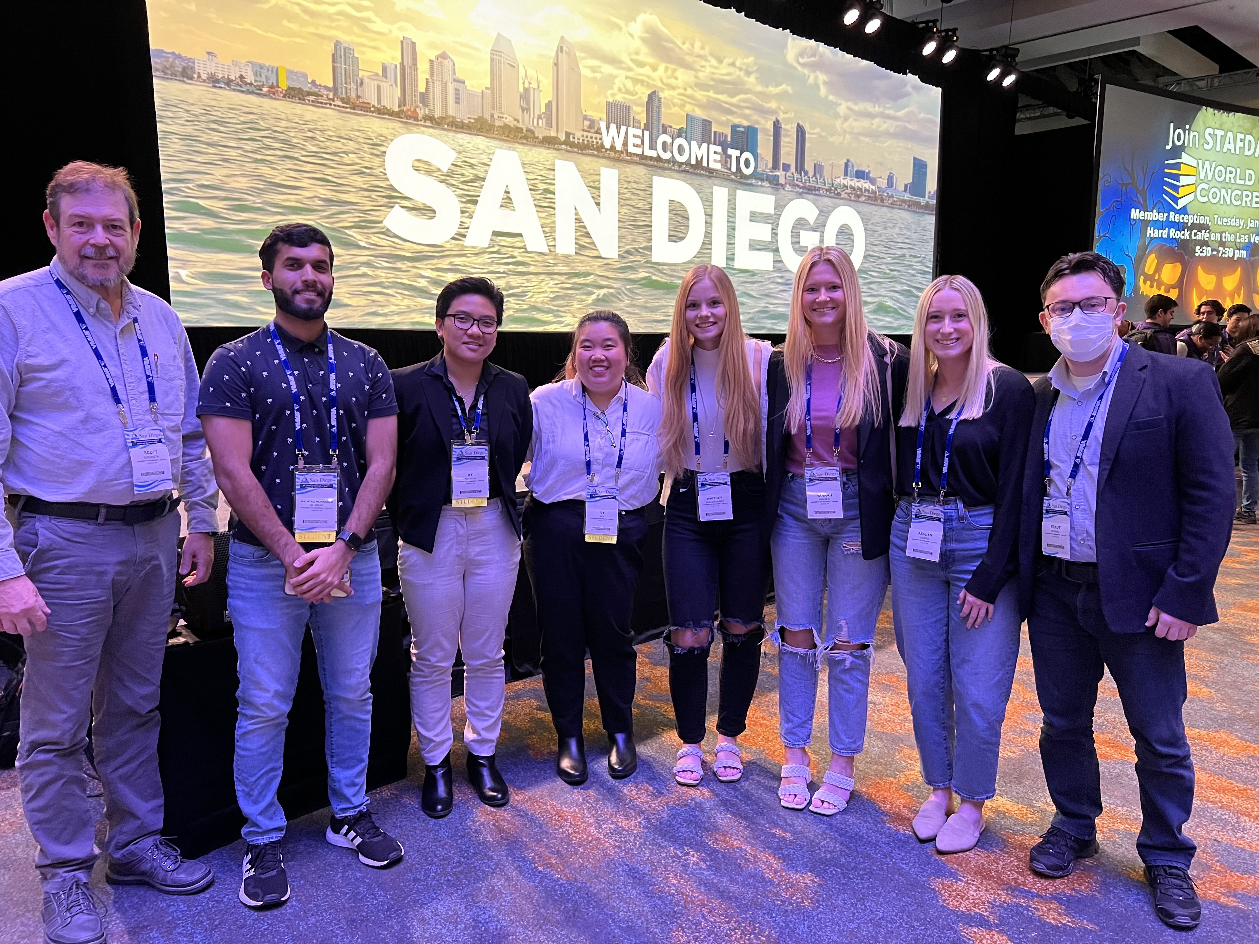 From left: Professor Scott Swenseth, Malik Al Waail, Vy Nguyen, Vy (Vivian) Bui, Whitney Wullenwaber, Hannah Walker, Ashlyn Dierks and Professor Erkut Sonmez at the annual STAFDA case competition.