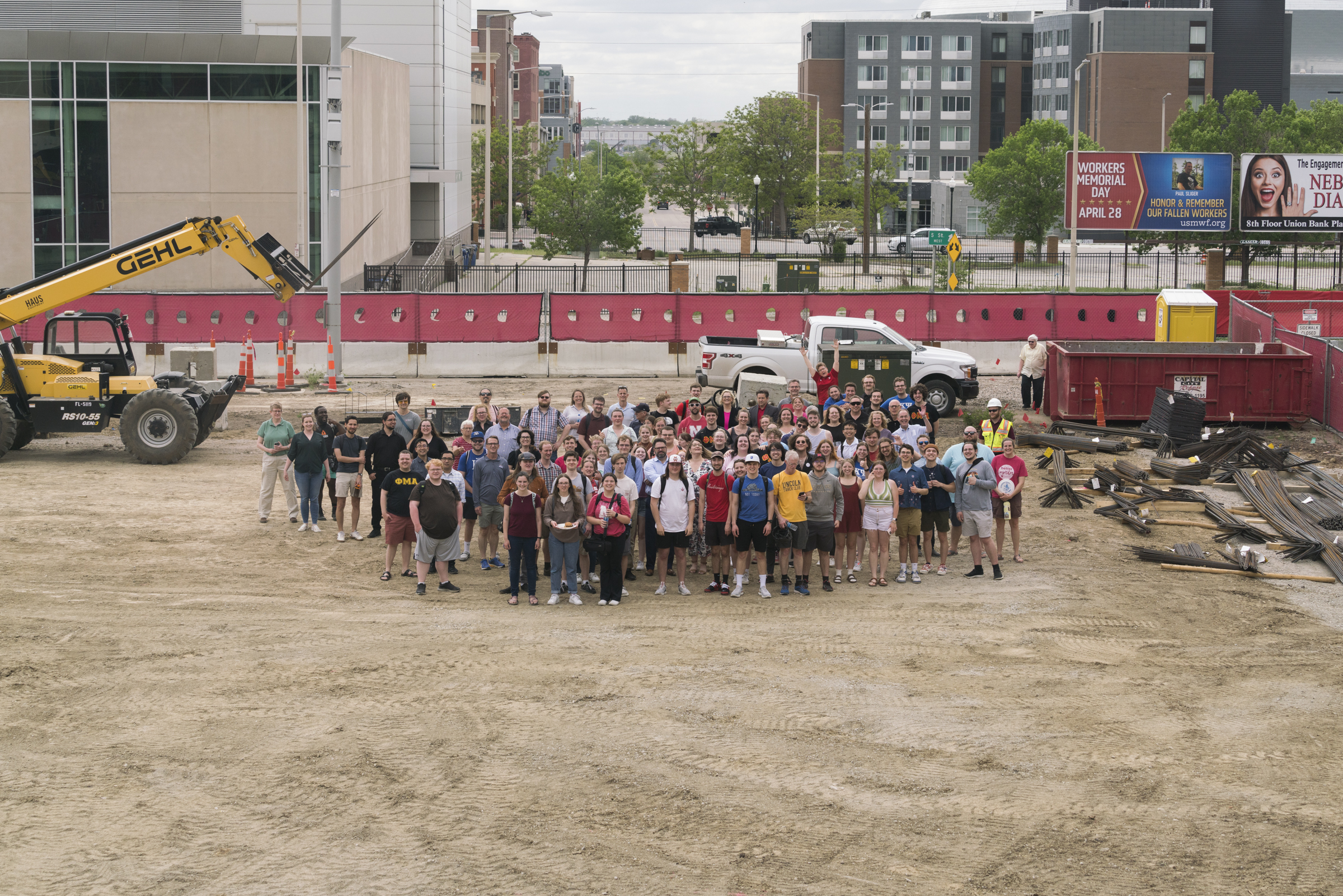 Students, faculty and staff in the Glenn Korff School of Music gathered for a group photo at the construction site for the new music building. Photo by Laura Cobb.