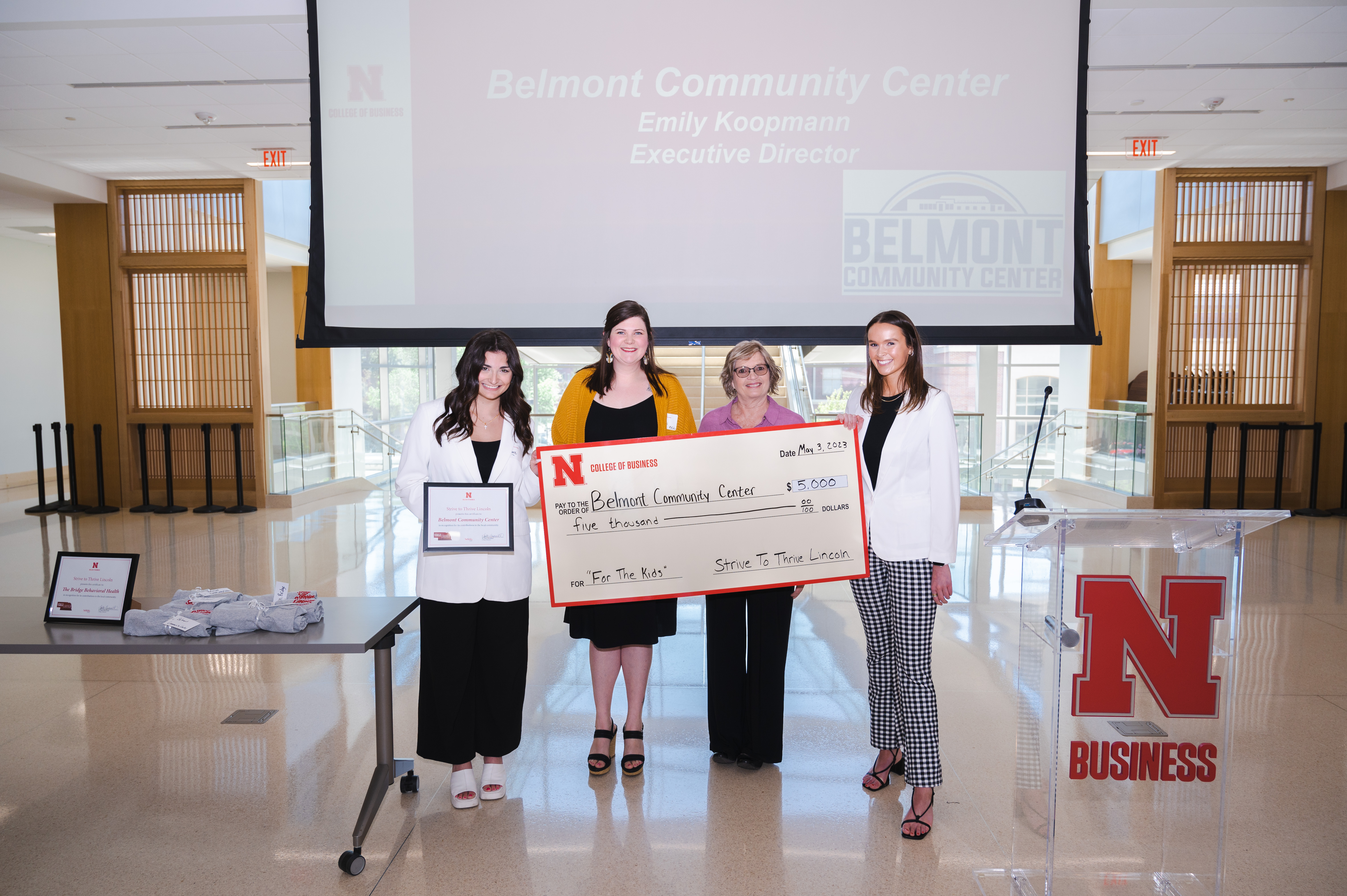 Class members present BCC staff members with a $5,000 grant at the May 3 Grant Ceremony.