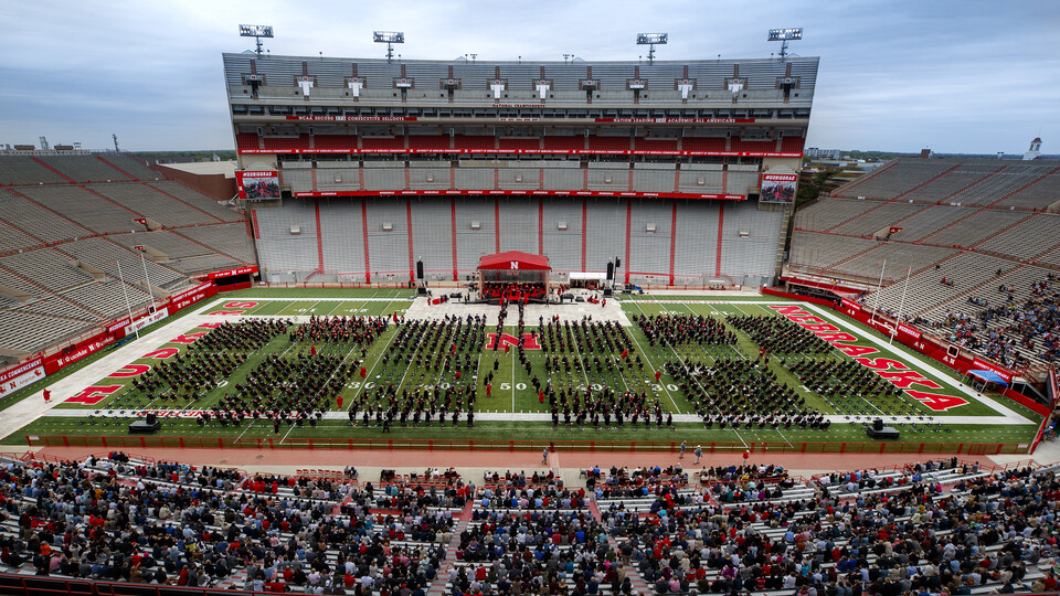 Graduates in Memorial Stadium.