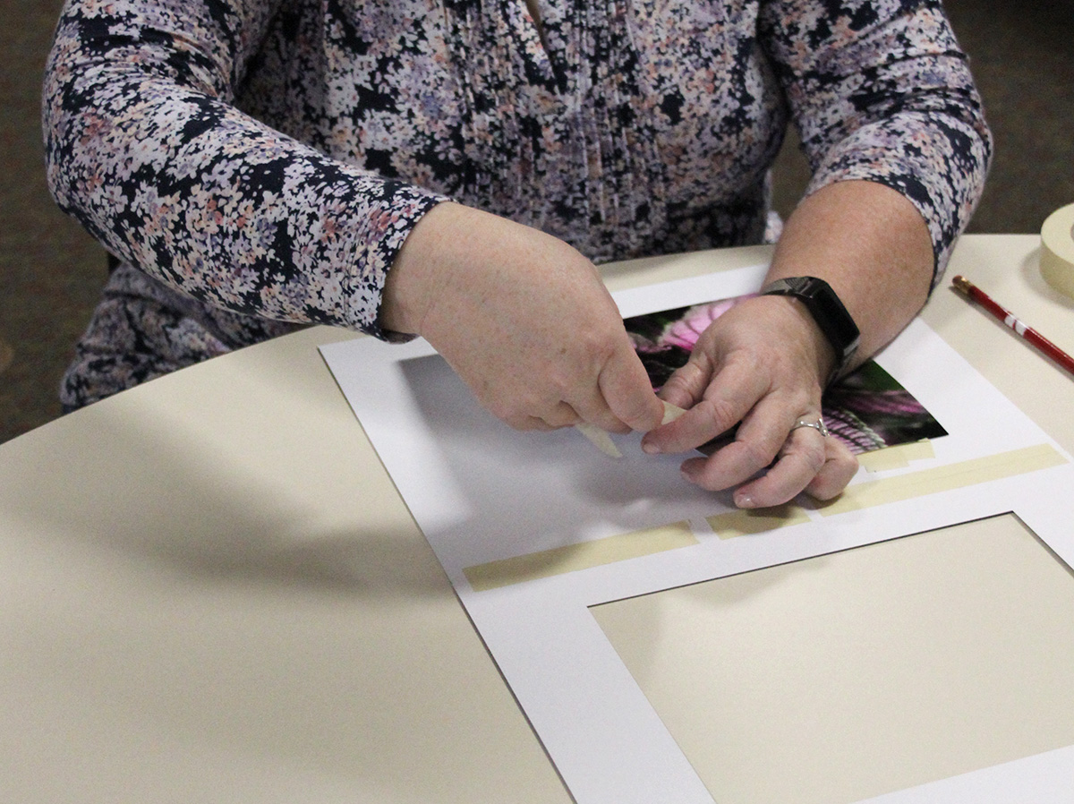 Michelle Huber demonstrating the matting process