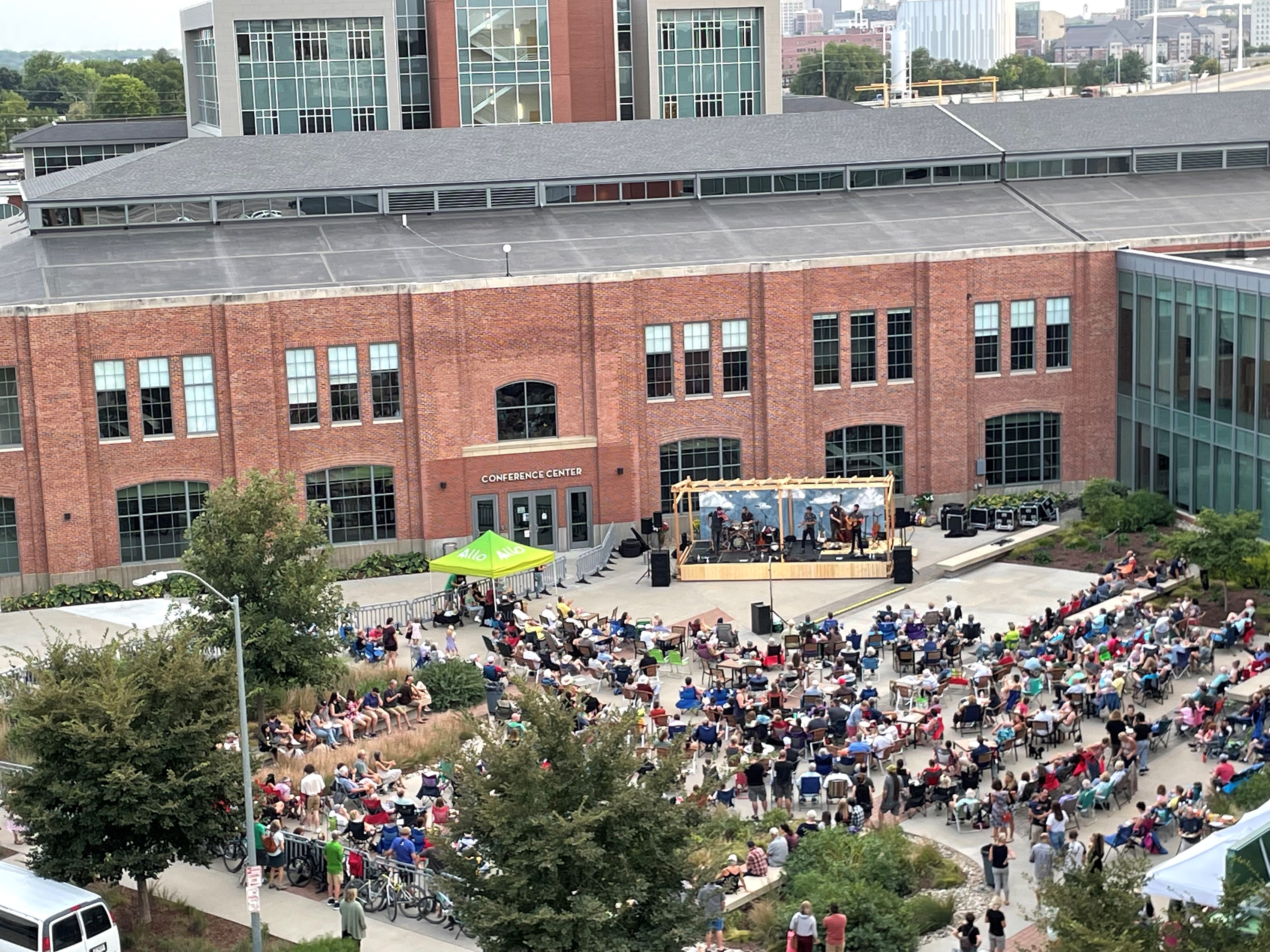 Nebraska Bluegrass Concert attendees enjoy a performance by The Steel Wheels in the NIC Plaza.