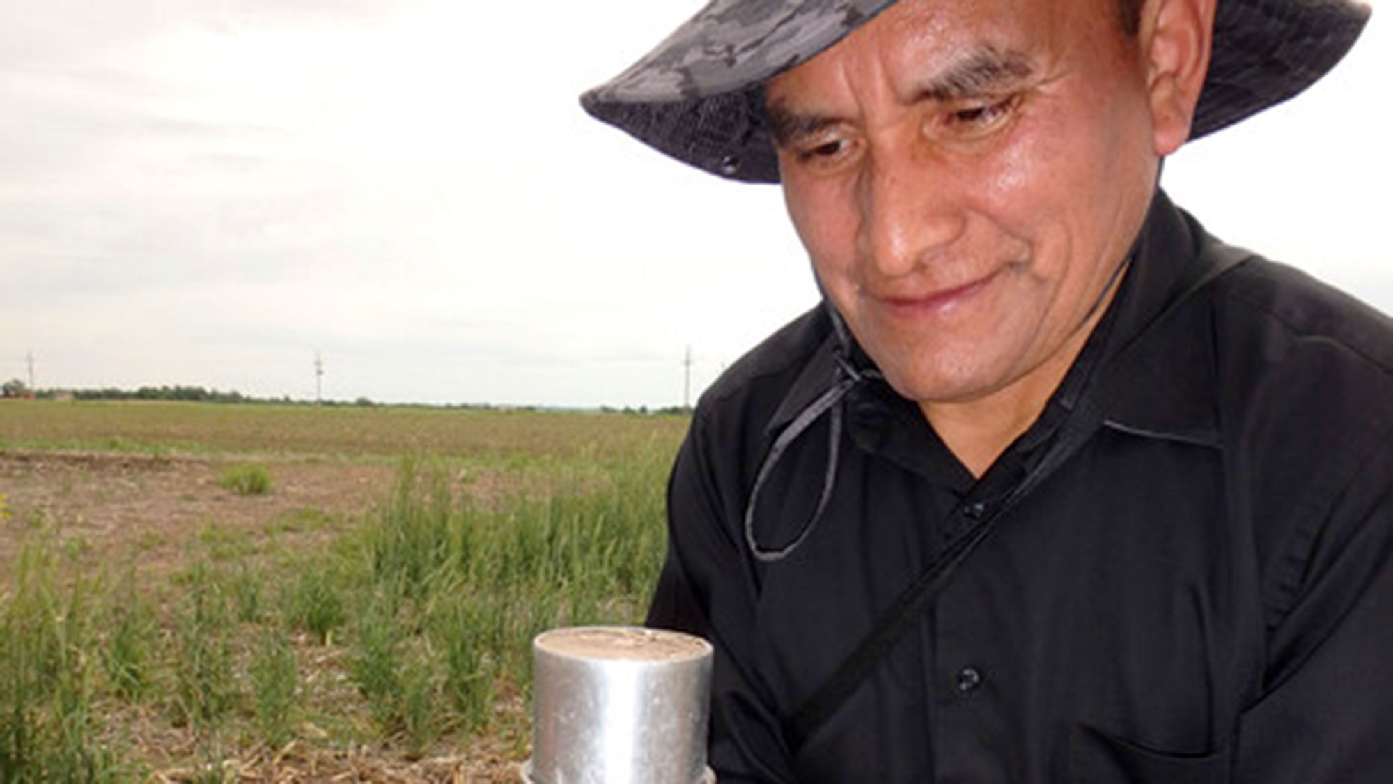 Nebraska soil scientist Humberto Blanco collects intact soil cores from fields with and without cover crops in eastern Nebraska to determine soil bulk density needed to compute soil C stocks on an equivalent mass basis. Blanco is the author of a new book 