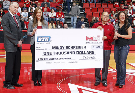 Mindy Schreiber (far right) is presented with the Big Ten Network's LiveBIG scholarship on Feb. 29.