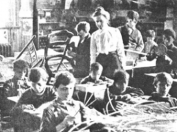 Elizabeth Farrell, first person to teach a class of special education students in an American public school, teaches in her ungraded classroom in New York City, 1899