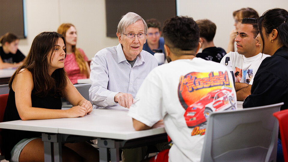 Jim Lewis (second from left), professor emeritus of mathematics, talks with a group of students funded by the STEM CONNECT project. In 2019, Lewis and colleagues received a $3.5 million grant for the project, which helps low-income students pursue degrees