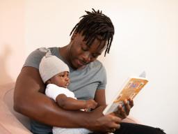 Dad reading to baby1200.jpg