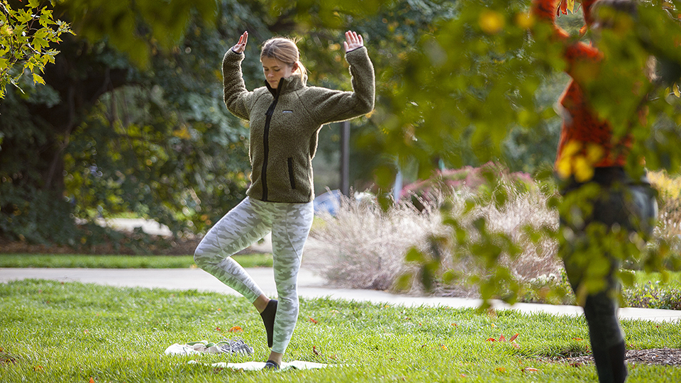 A student practices Yoga in the Maxwell Arboretum on East Campus. October 15, 2020. [photo by Abby Durheim for University Communication]