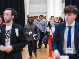 Students move to their competition rooms during the first round of New Venture Competition