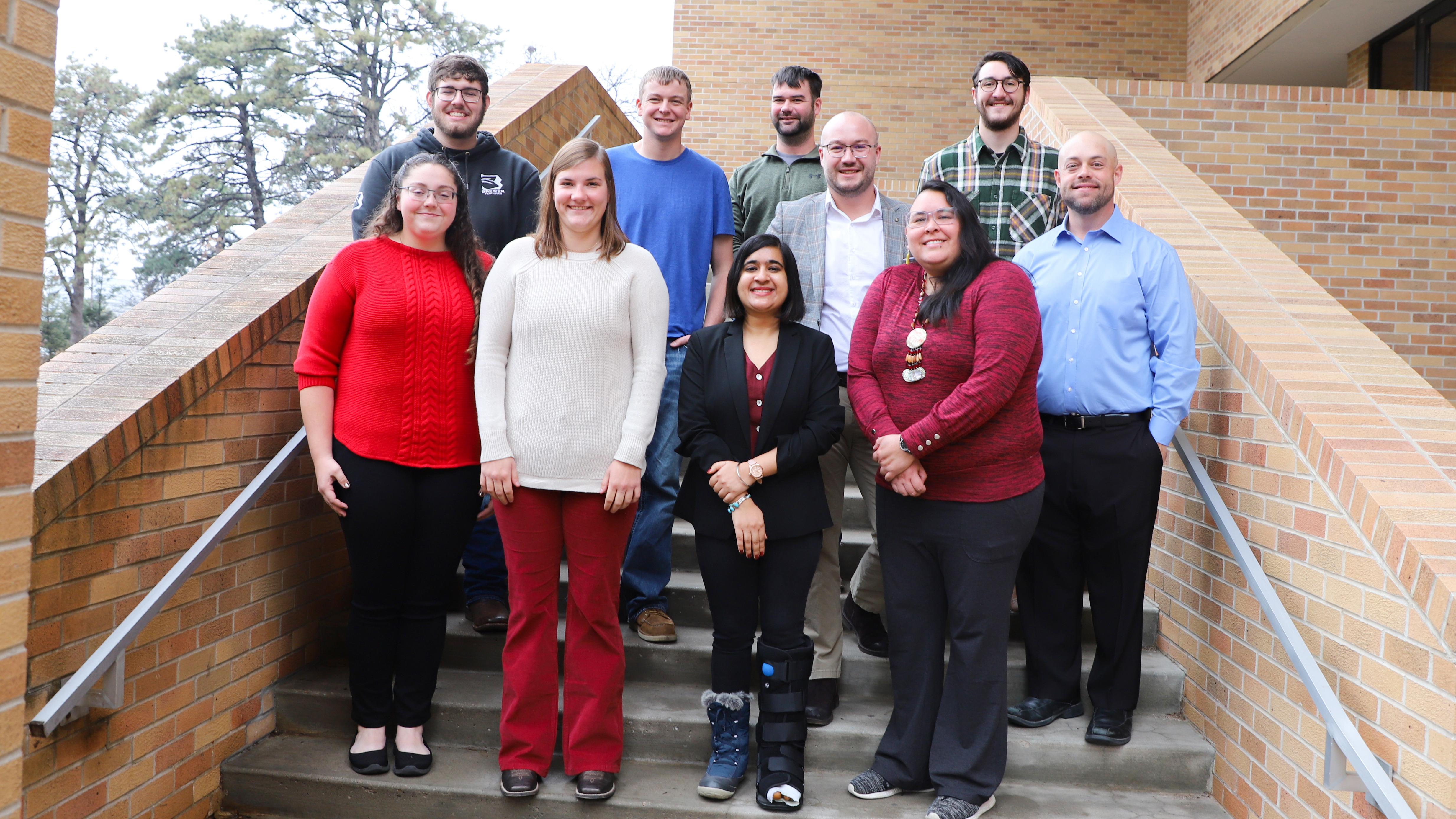 Students who attended the department reception included Seth Brewer (back row, from left), Matt Mittman, Nicholas Kinzer, Milos Zaric, Jacob Hillis, Lance Gunderson, Emily Hanson (front row, from left), Brinn Space, Ramandeep Kaur and Kahheetah Barnoskie.