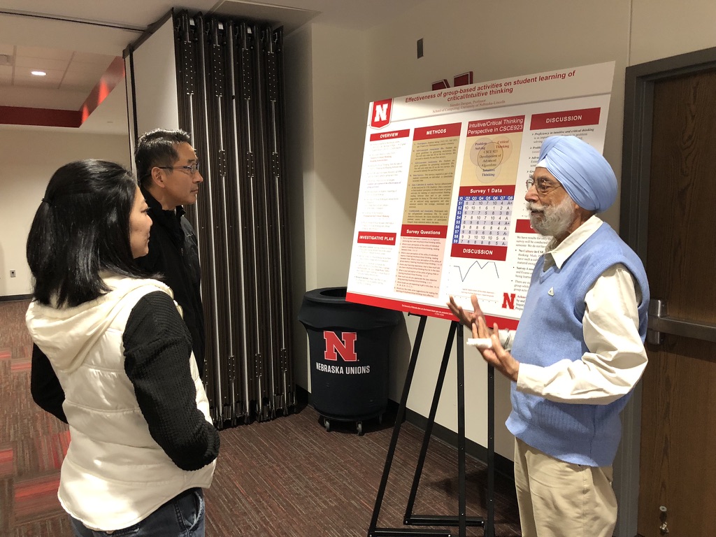 Jitender Deogun presents his research at the Advanced Program poster session in December 2023.