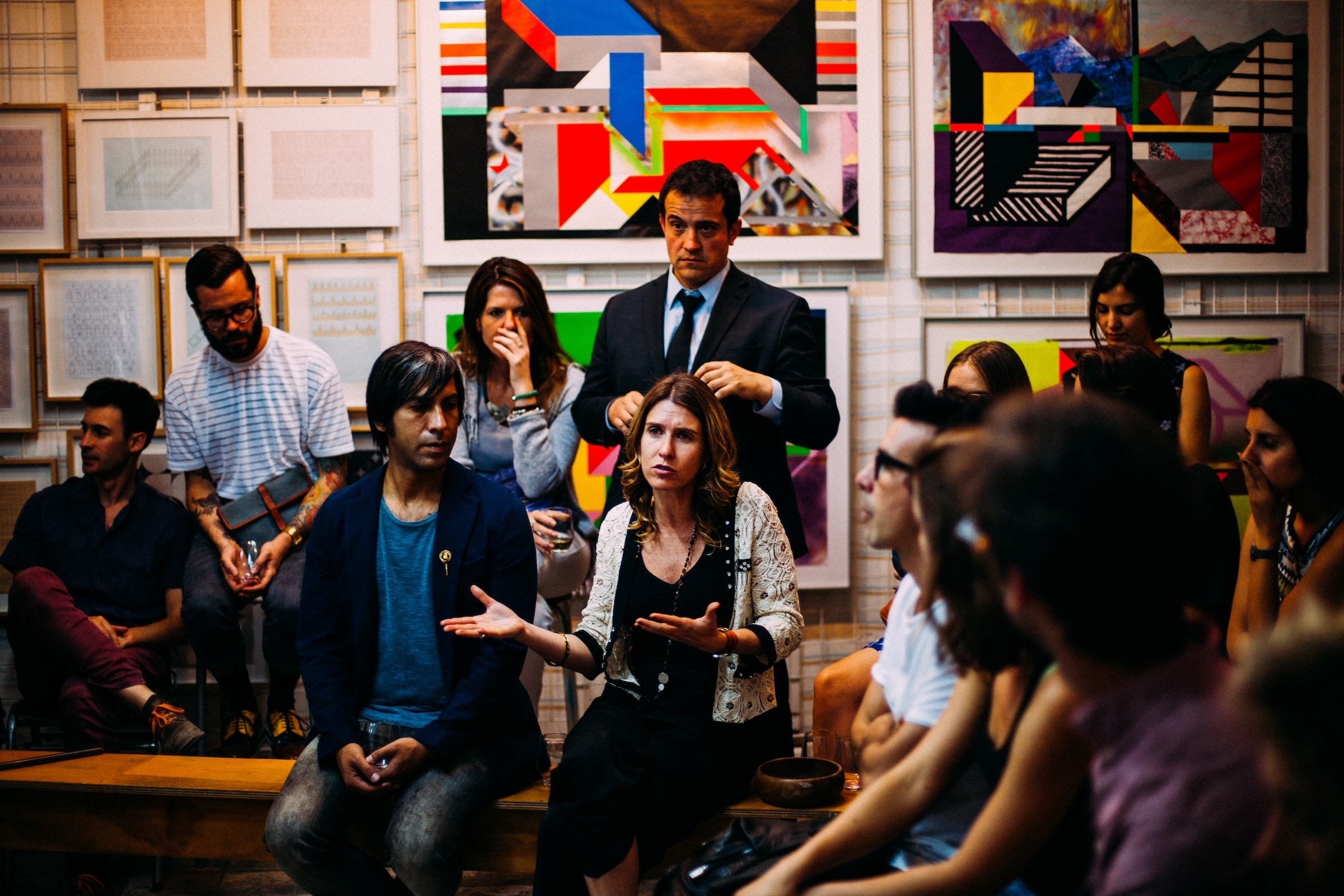 A group of people having a conversation.