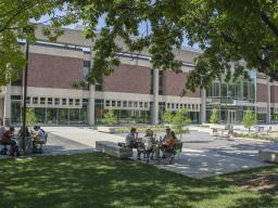 Students studying outside of the Adele Hall Learning Commons