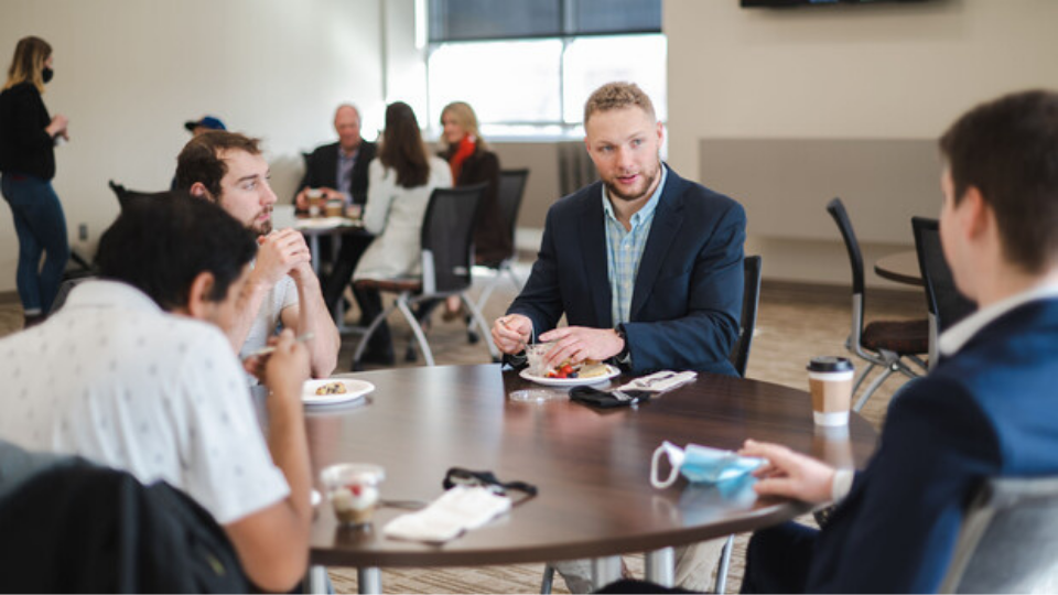 Jackson Stansell, founder of Sentinel Fertigation, chats with Husker Venture Fund members