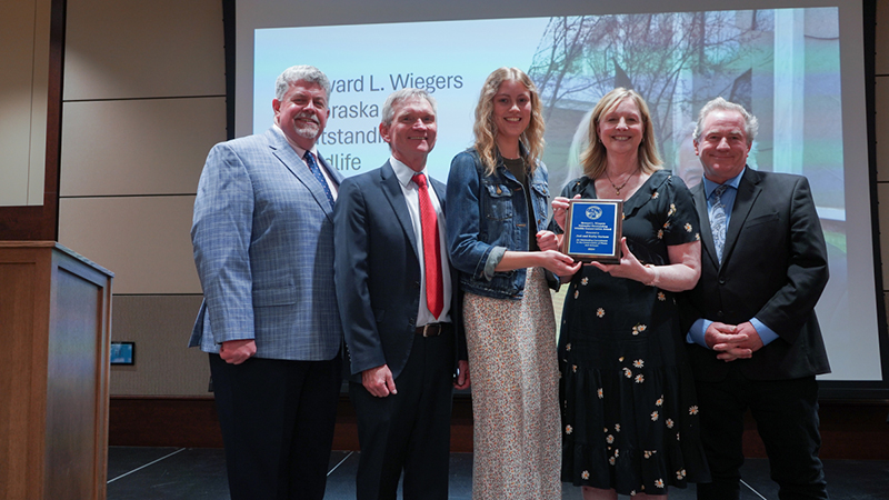 (from left) Larkin Powell, school director; John Carroll, former school director; Kara Kniep; Kathy and Joel Sartore. Photo credit: Marissa Lindemann