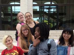 A group of students in front of the Sheldon Art Gallery.