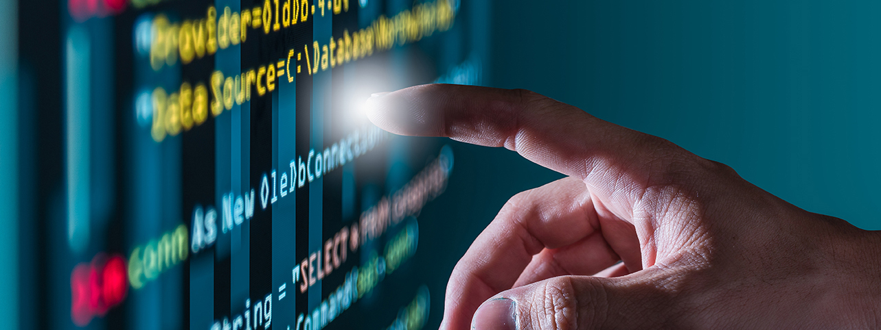 Finger pointing at line of code
