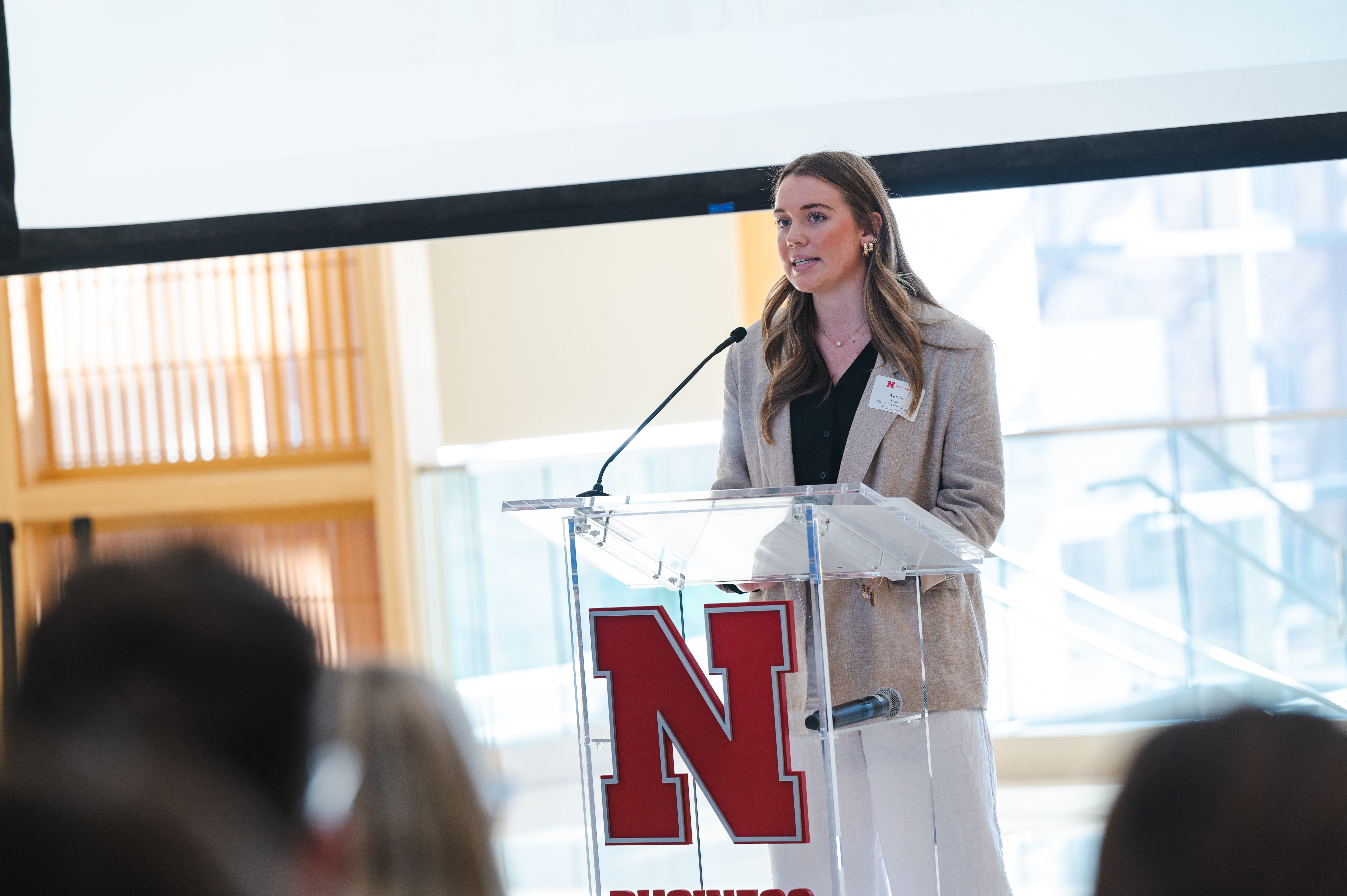 Fall 2023 class member Alexis Haas speaks at the grant ceremony.