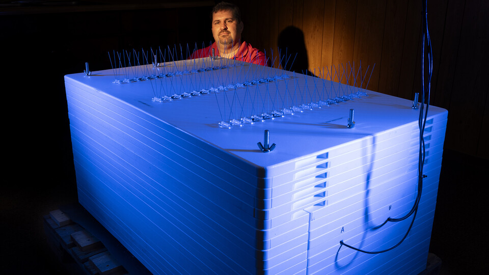  Craig Chandler | University Communication and Marketing Trenton Franz, professor of hydrogeophysics at Nebraska, stands beside the newly installed neutron monitor, one of only three in the United States. 