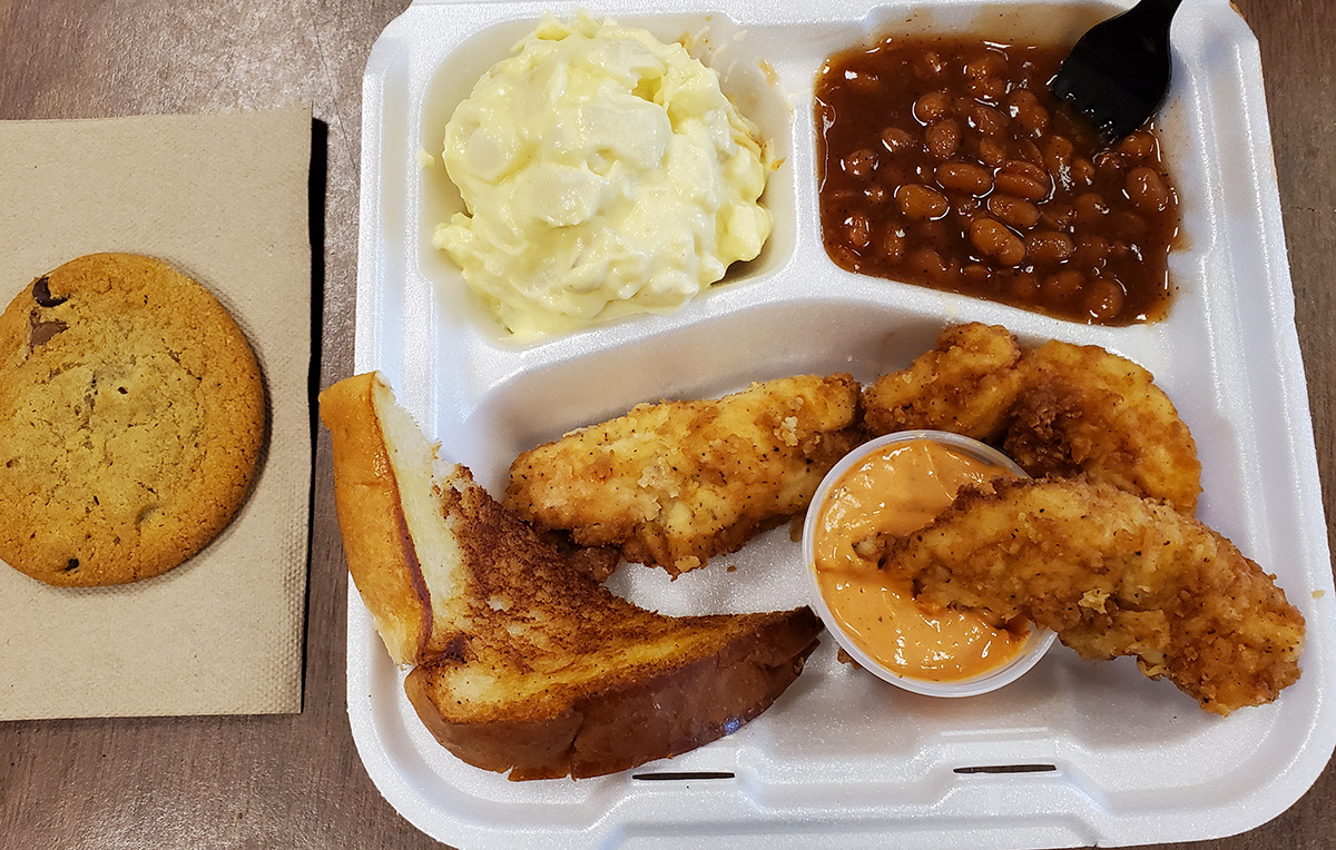 4-H Council's chicken dinner featuring Slim Chickens, in a to-go box.