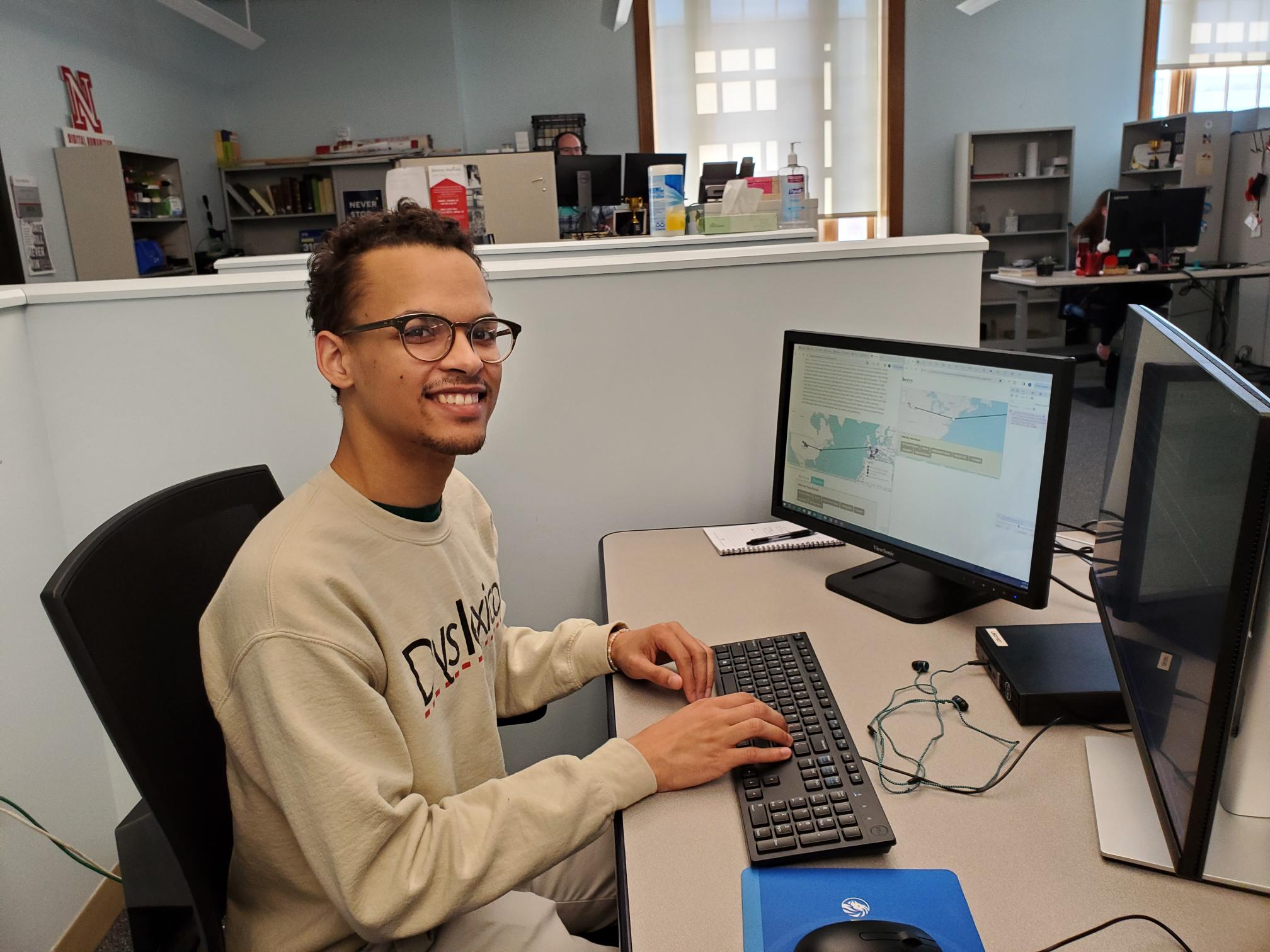 Tristan Curd working in the Center for Digital Research in the Humanities.