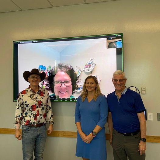 Theresa Haack (pictured third from left) with dissertation advisory committee members Guy Trainin, Stephanie Wessels (on screen), and Kelley Buchheister.