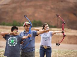 4-H Archery Leader instructing youth