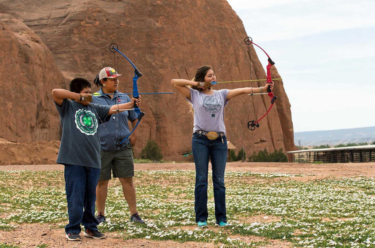 4-H Archery Leader instructing youth