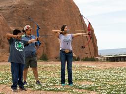 4-H Archery Leader instructing youth