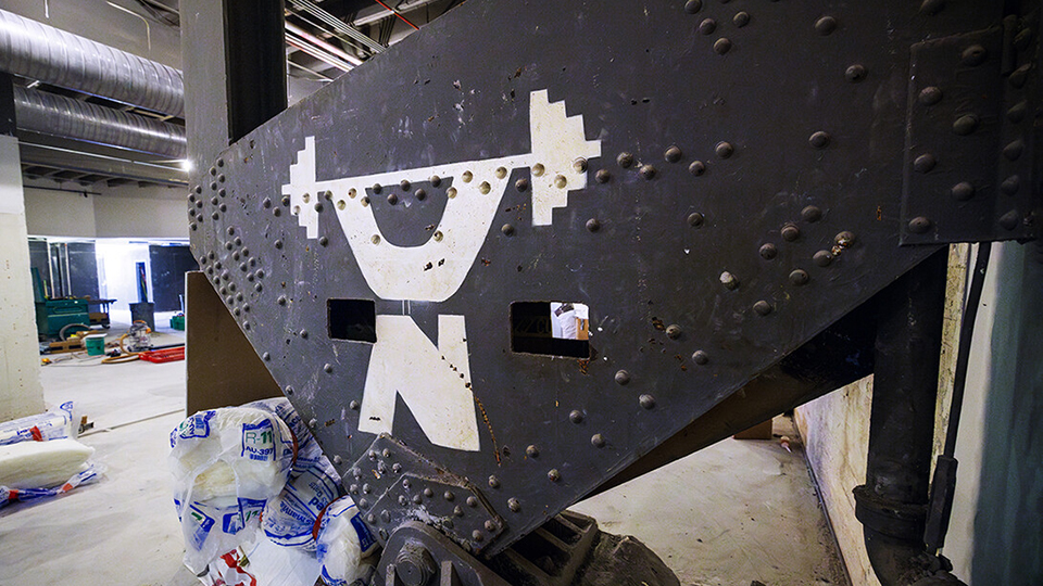 When the women’s locker room was gutted, it revealed the original ironwork for the Coliseum. [Craig Chandler | University Communication and Marketing]