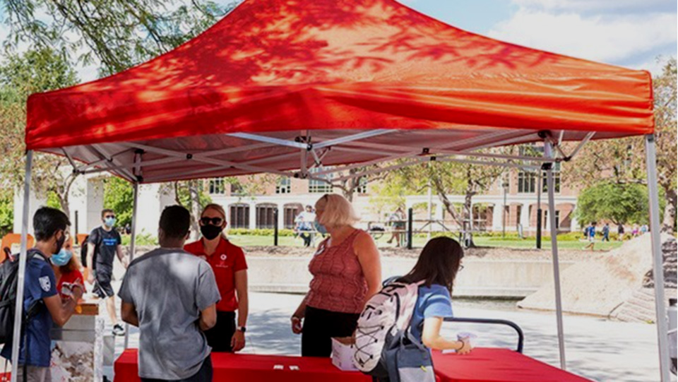 Look for the big red tents at three locations on City Campus. 