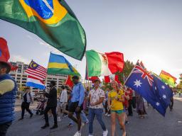 Students from around the world march in the 2023 homecoming parade. | Craig Chandler | University Communication and Marketing 