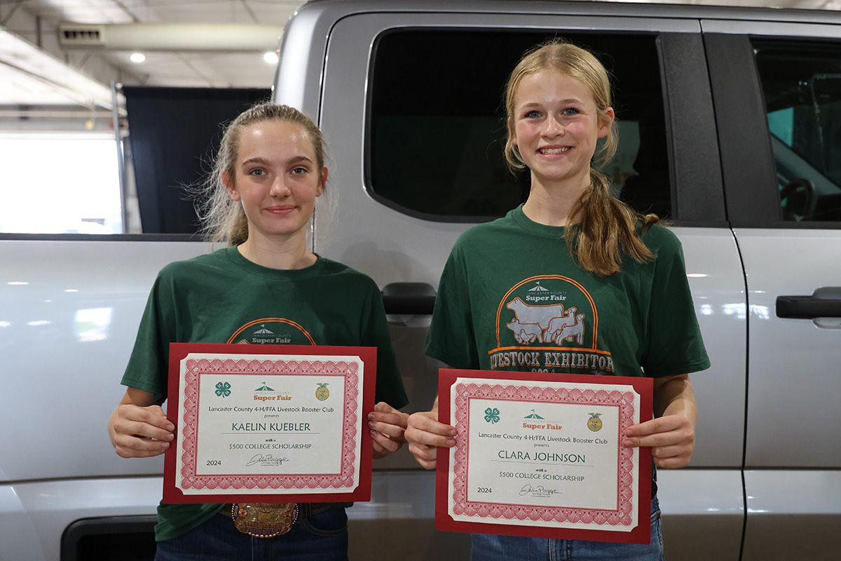 (L–R) Kaelin Kuebler and Josie Johnson (standing in for her sister Clara Johnson).